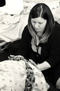 Doula massaging client in labor.